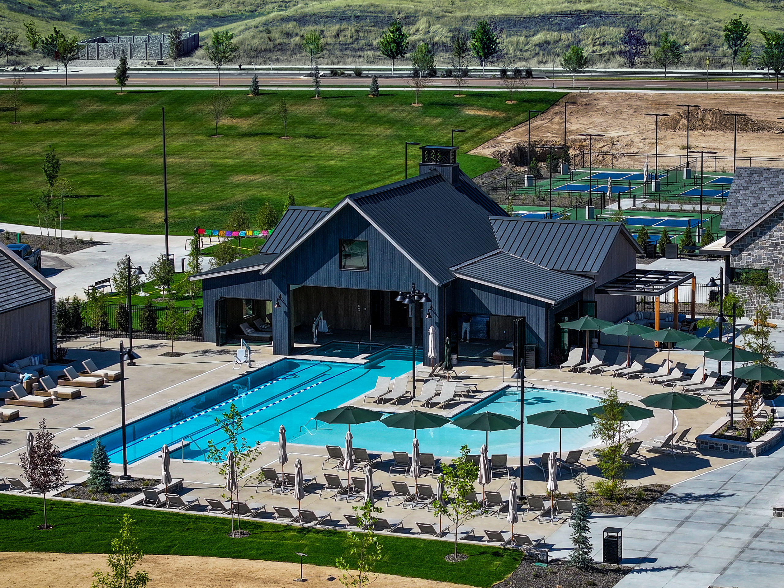 Metal roofing done by Osmsus Roofing showcased in a Valnova community in Emmett, Idaho